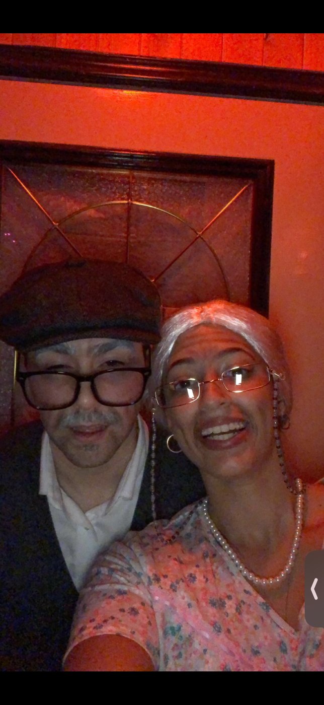 Austin and Bianca in costume at a party